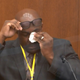 Philonise Floyd, brother of George Floyd, becomes emotional as he testifies as Hennepin County Judge Peter Cahill presides over court Monday, April 12, 2021